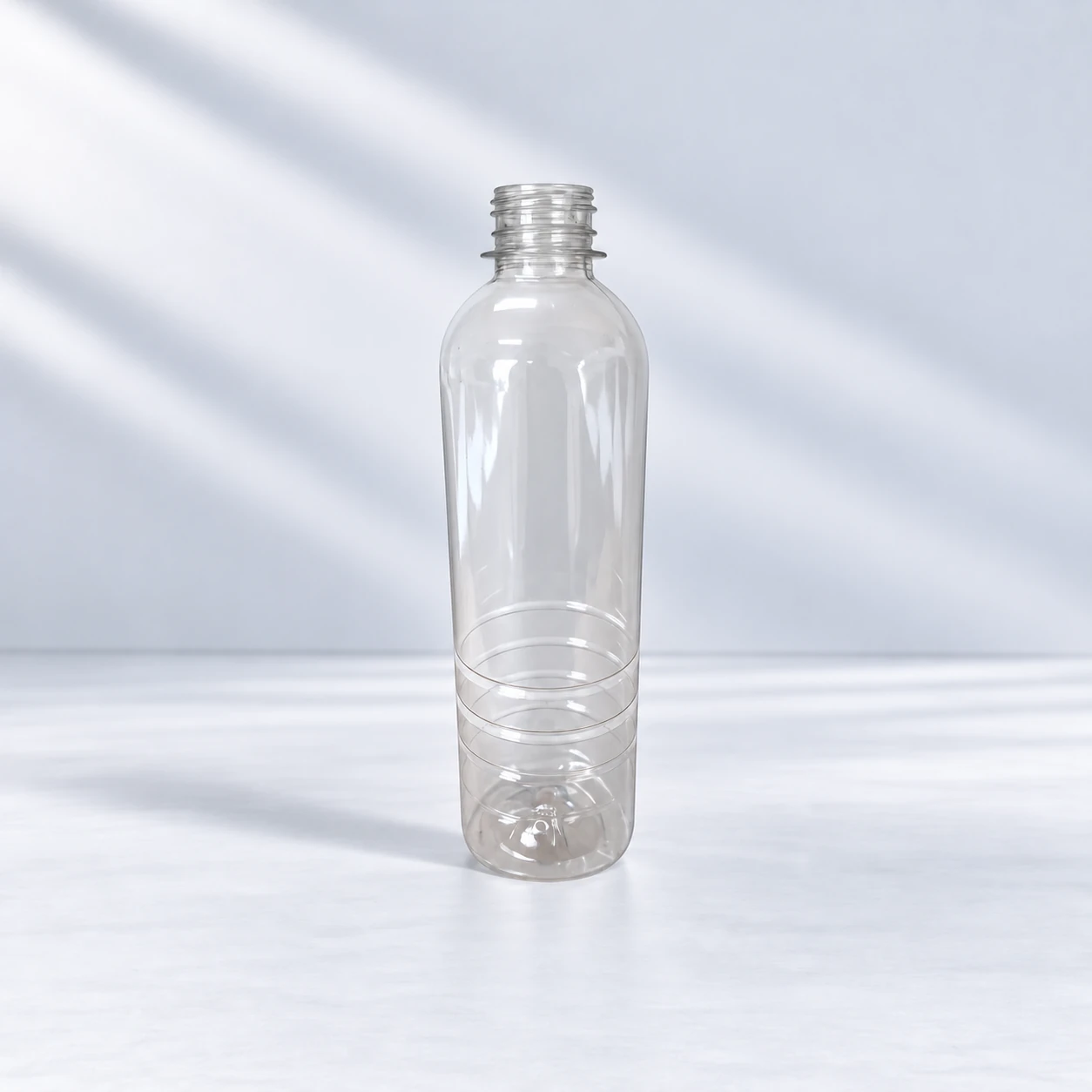 Clear 500 ml PET water or juice bottle with an open threaded neck